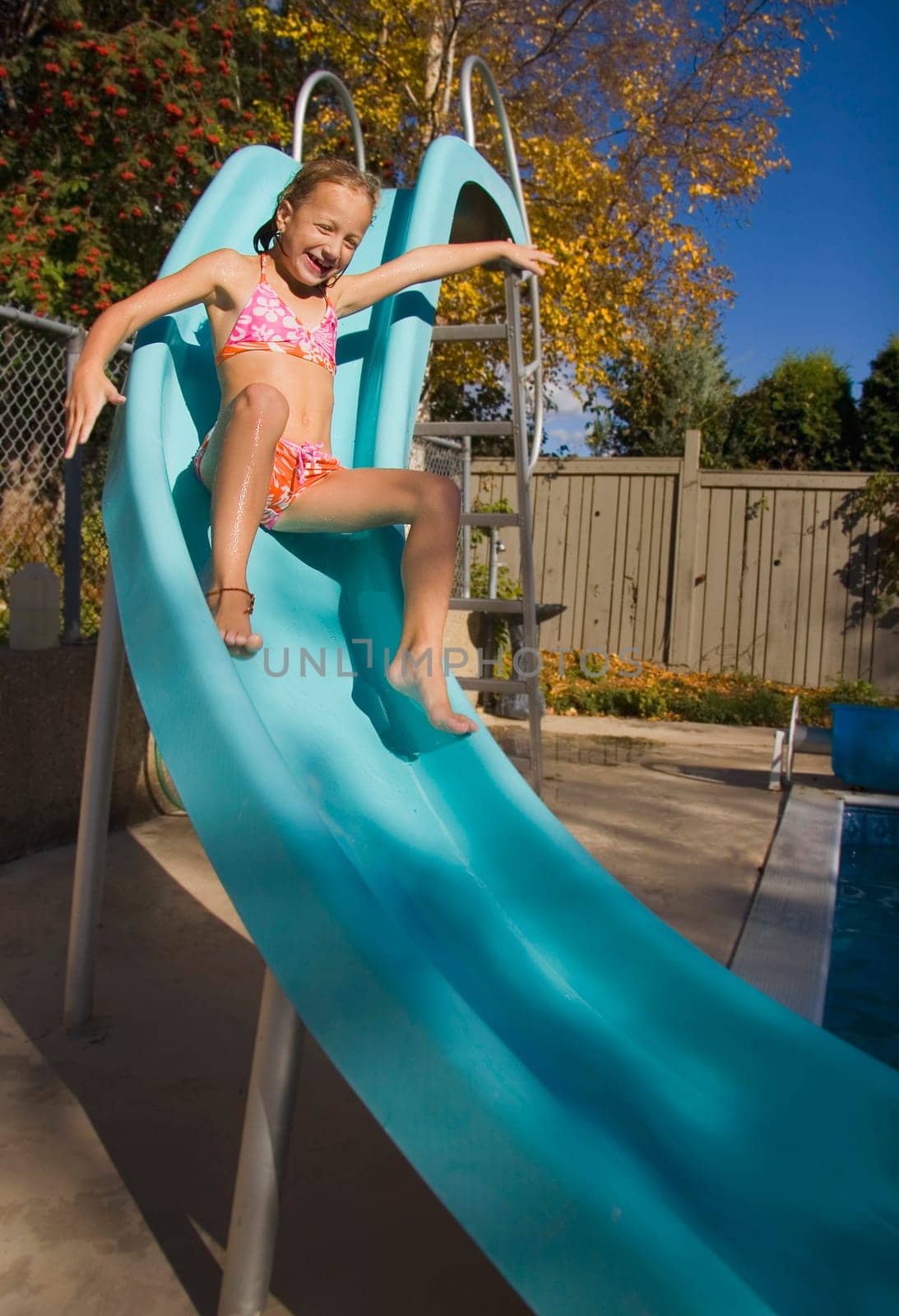Sliding down a slide