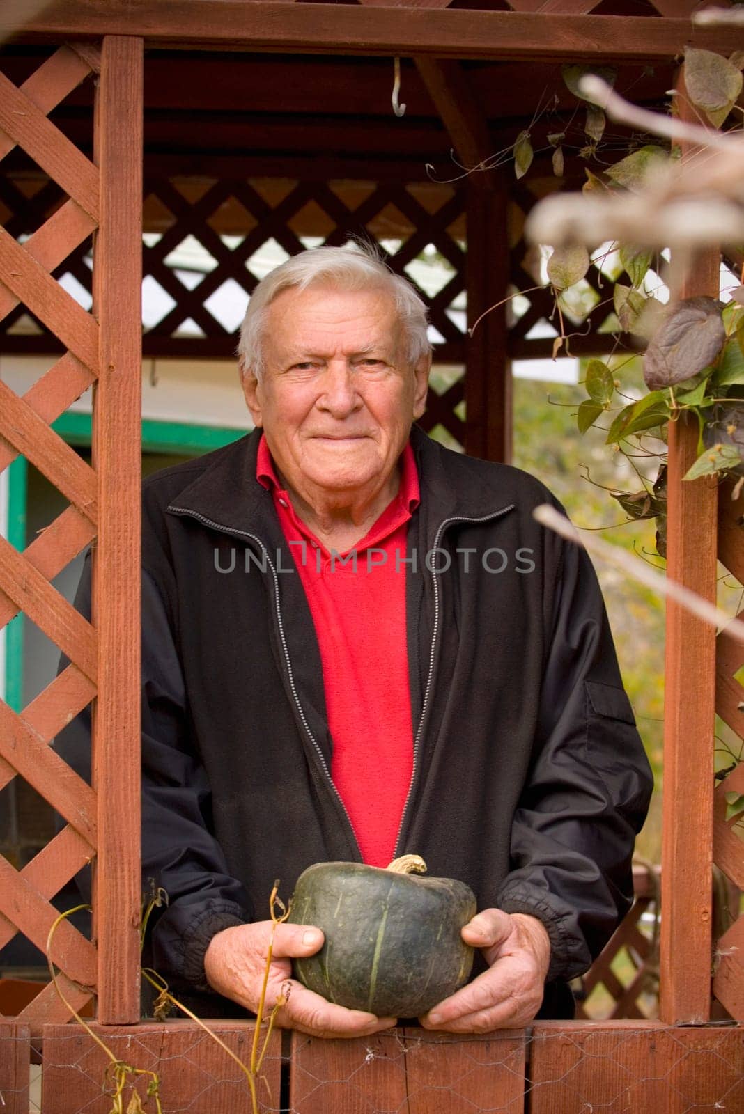 A senior with a squash