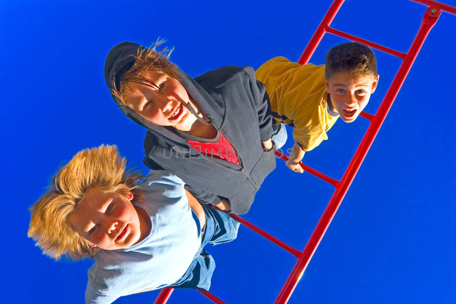 Kids hang upside down
