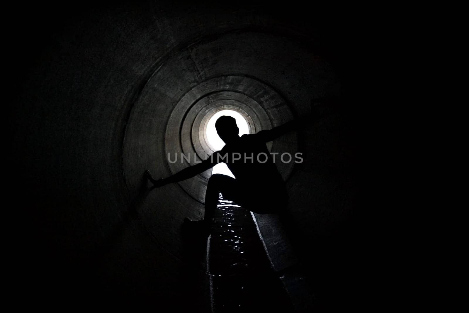 Person in tunnel