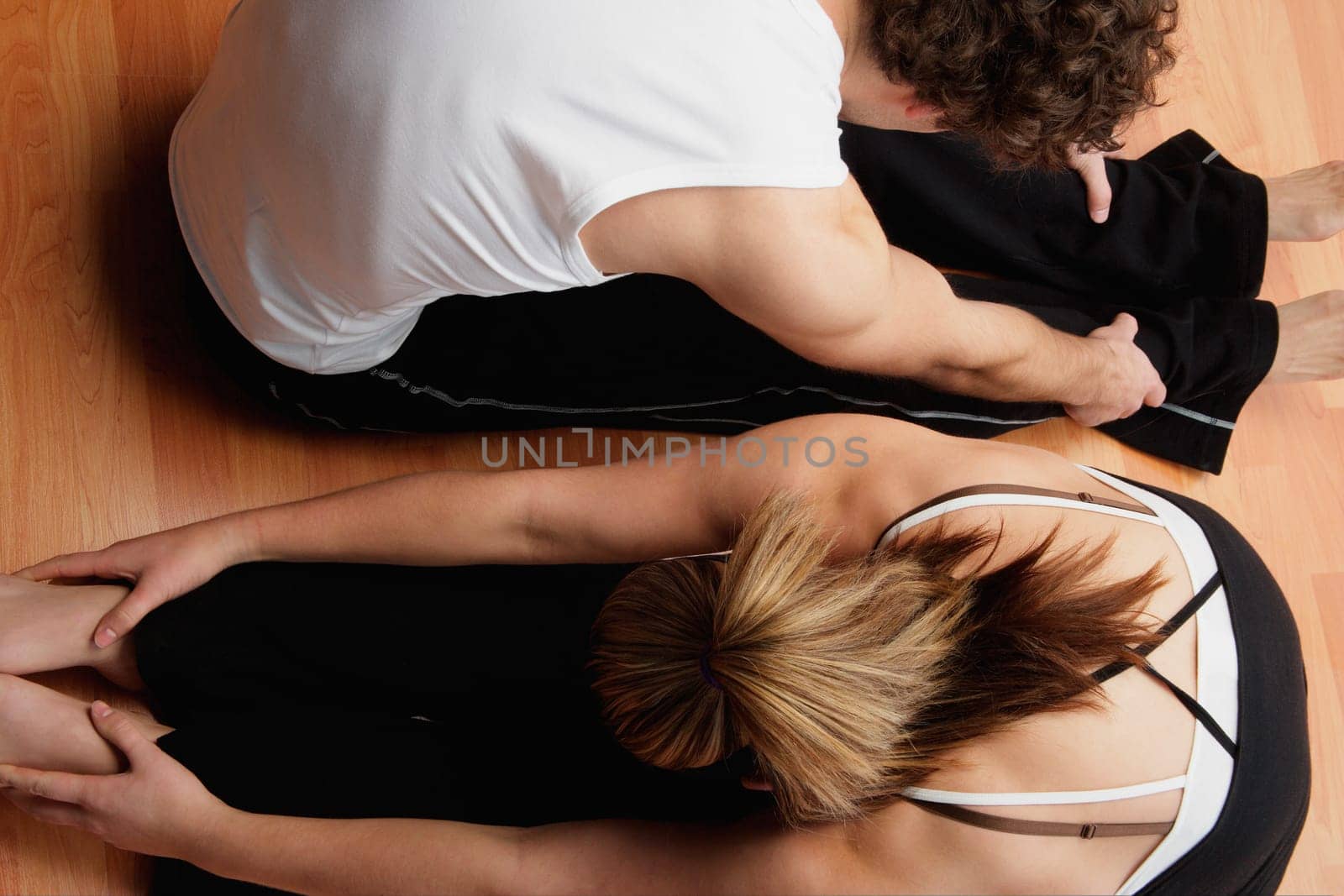 Couple stretching together