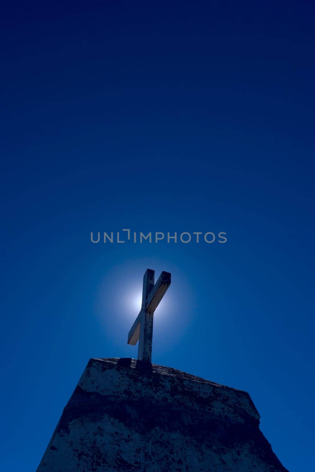 The cross and a light