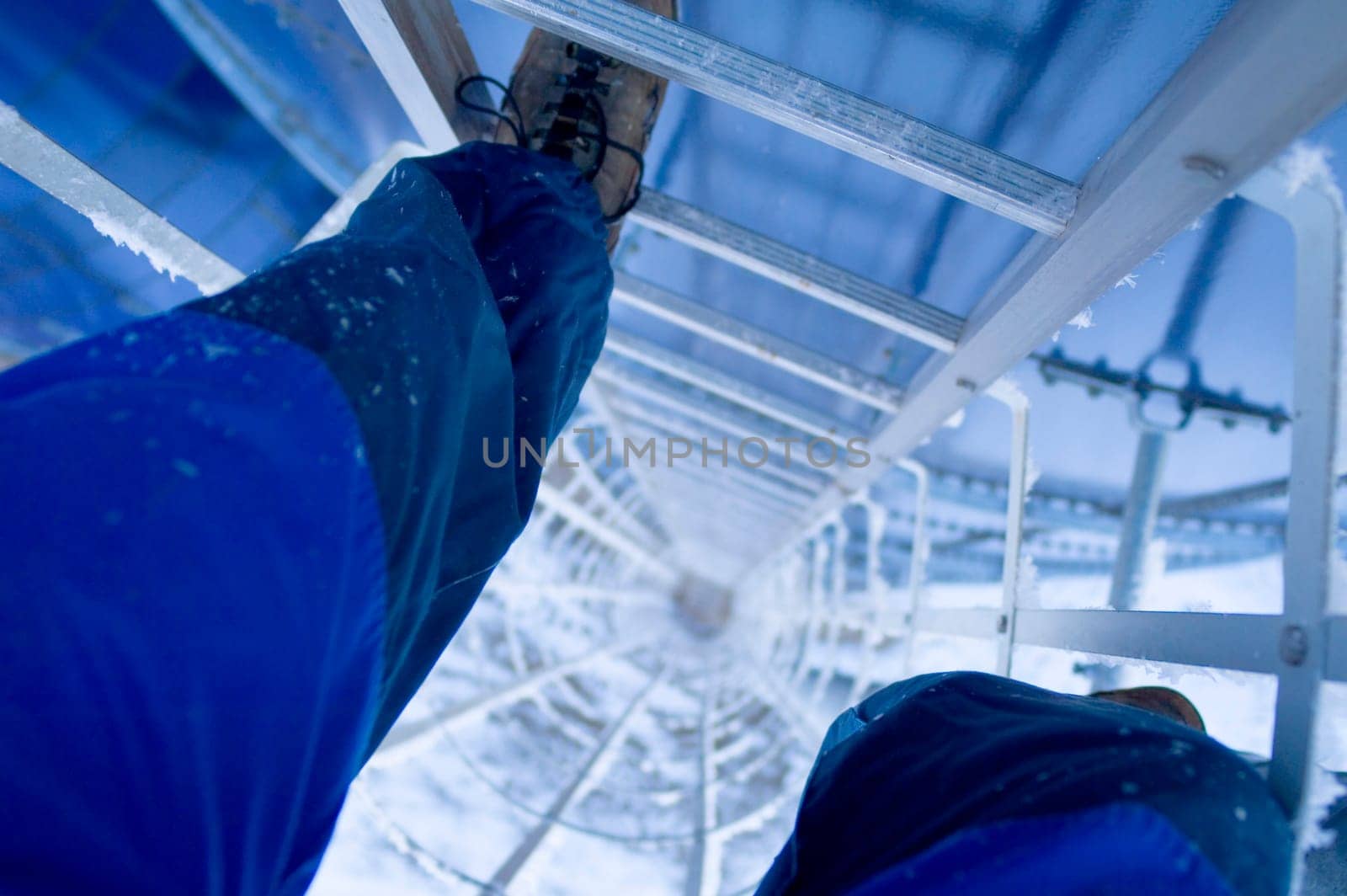 Person climbing ladder