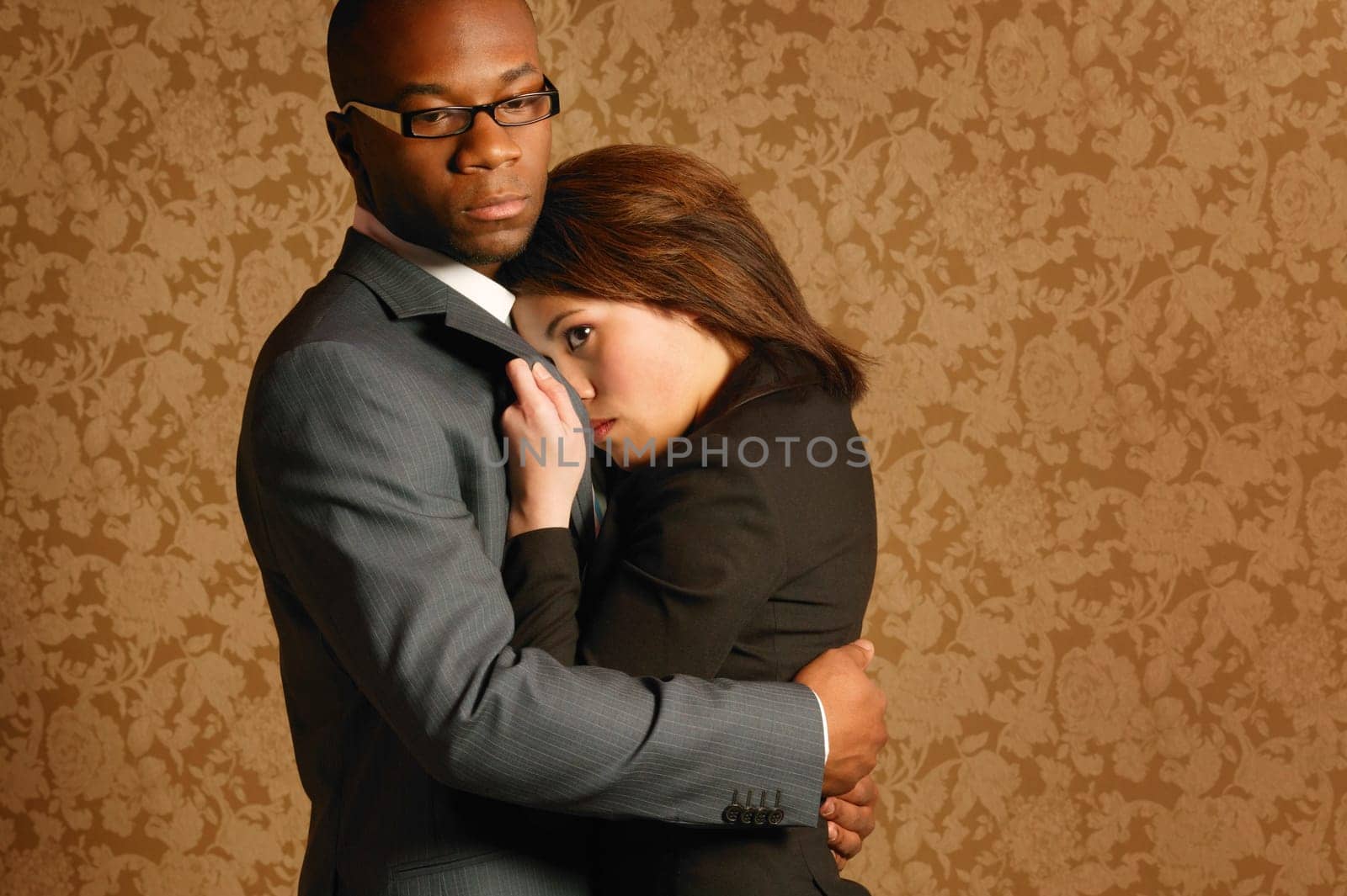 Couple wearing suits