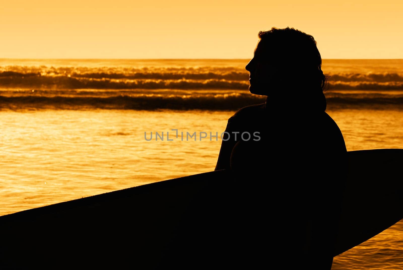 Silhouette of a surfer
