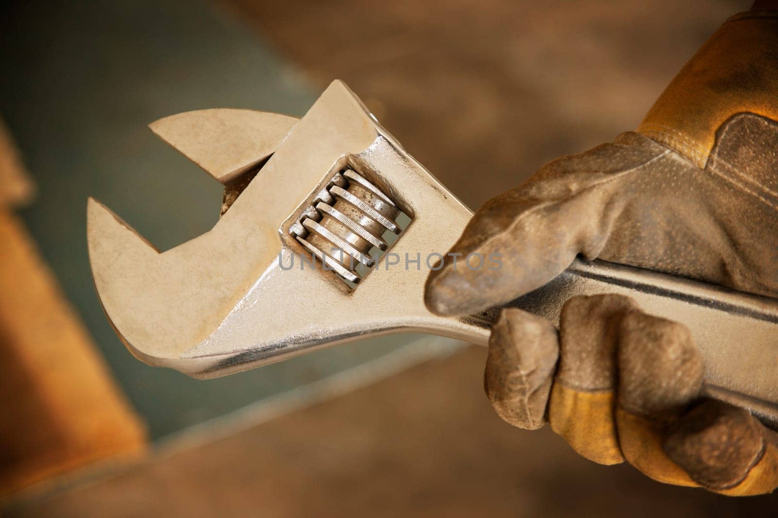 A crescent wrench