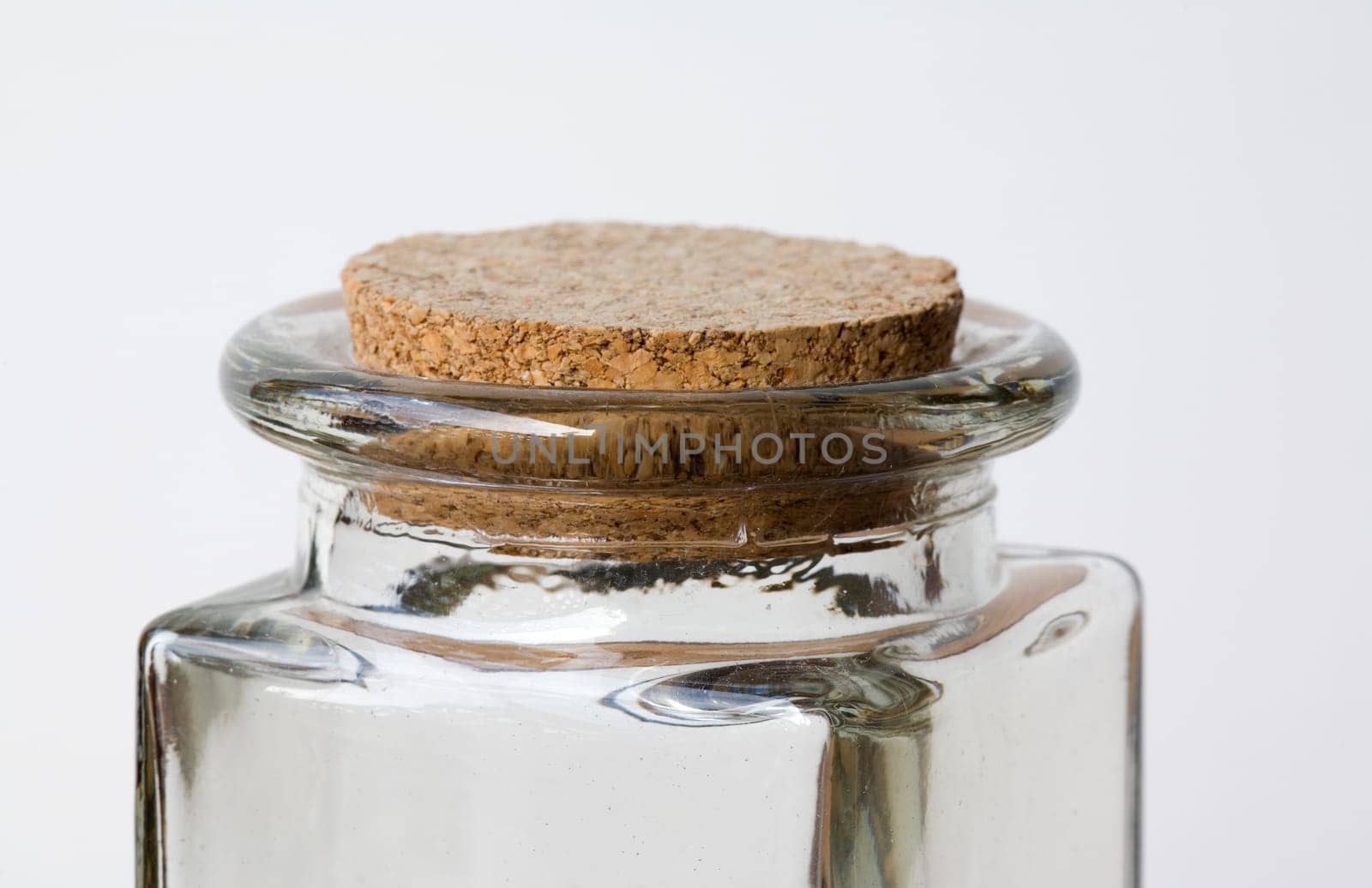 Clear glass jar with cork stopper