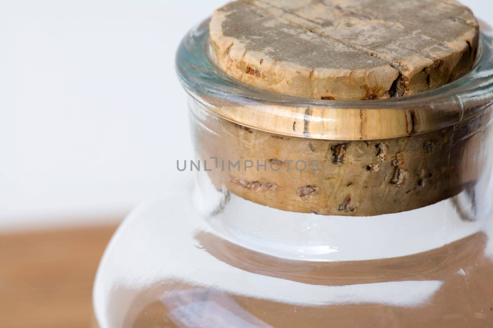 Clear glass jar with cork stopper