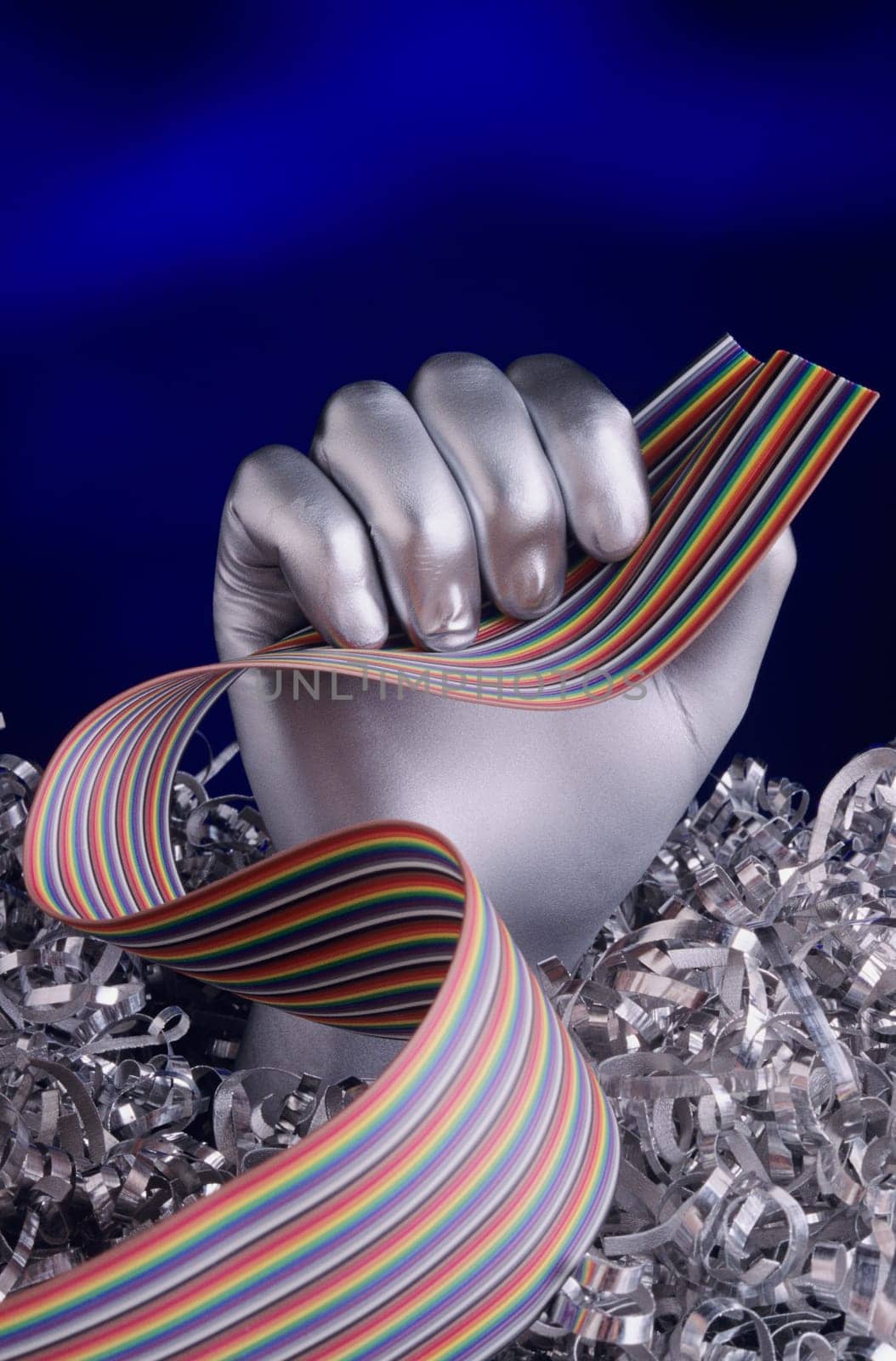 Silver Hand holding Computer cable