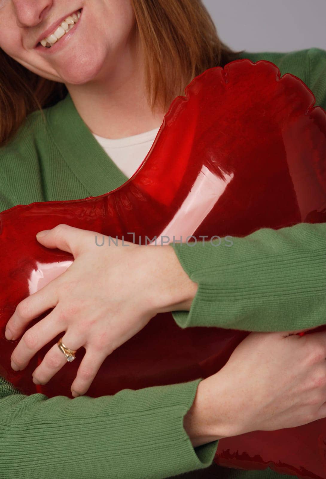 Woman hugging heart