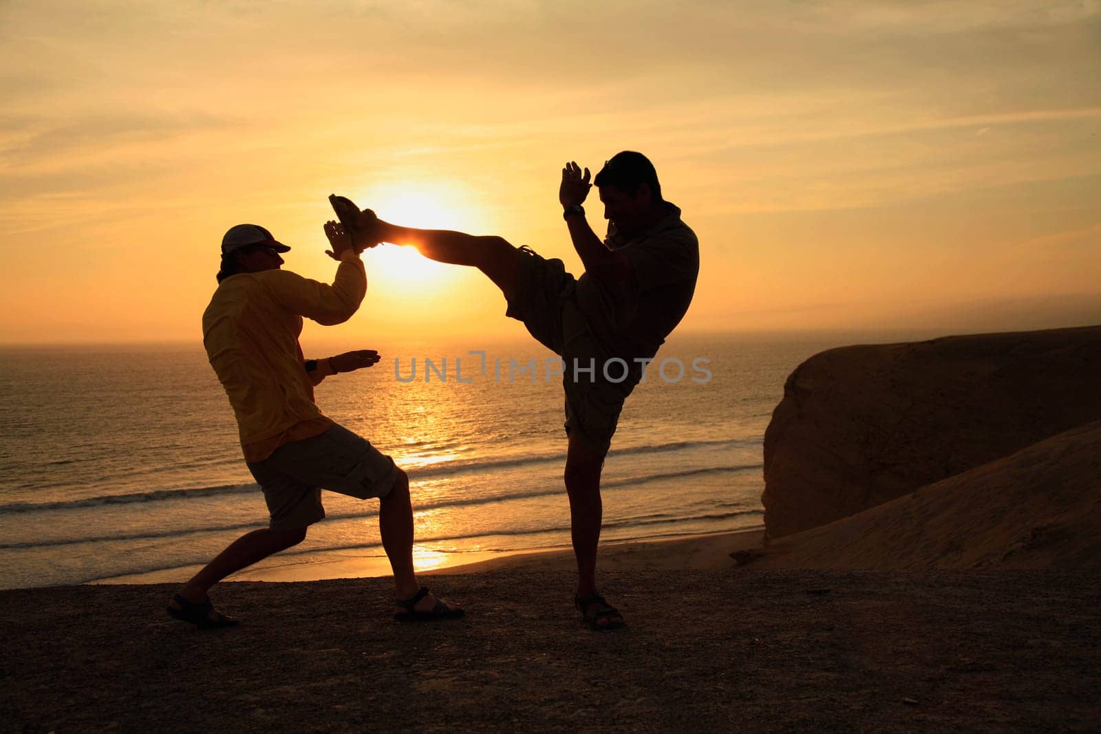 Fighting by the beach