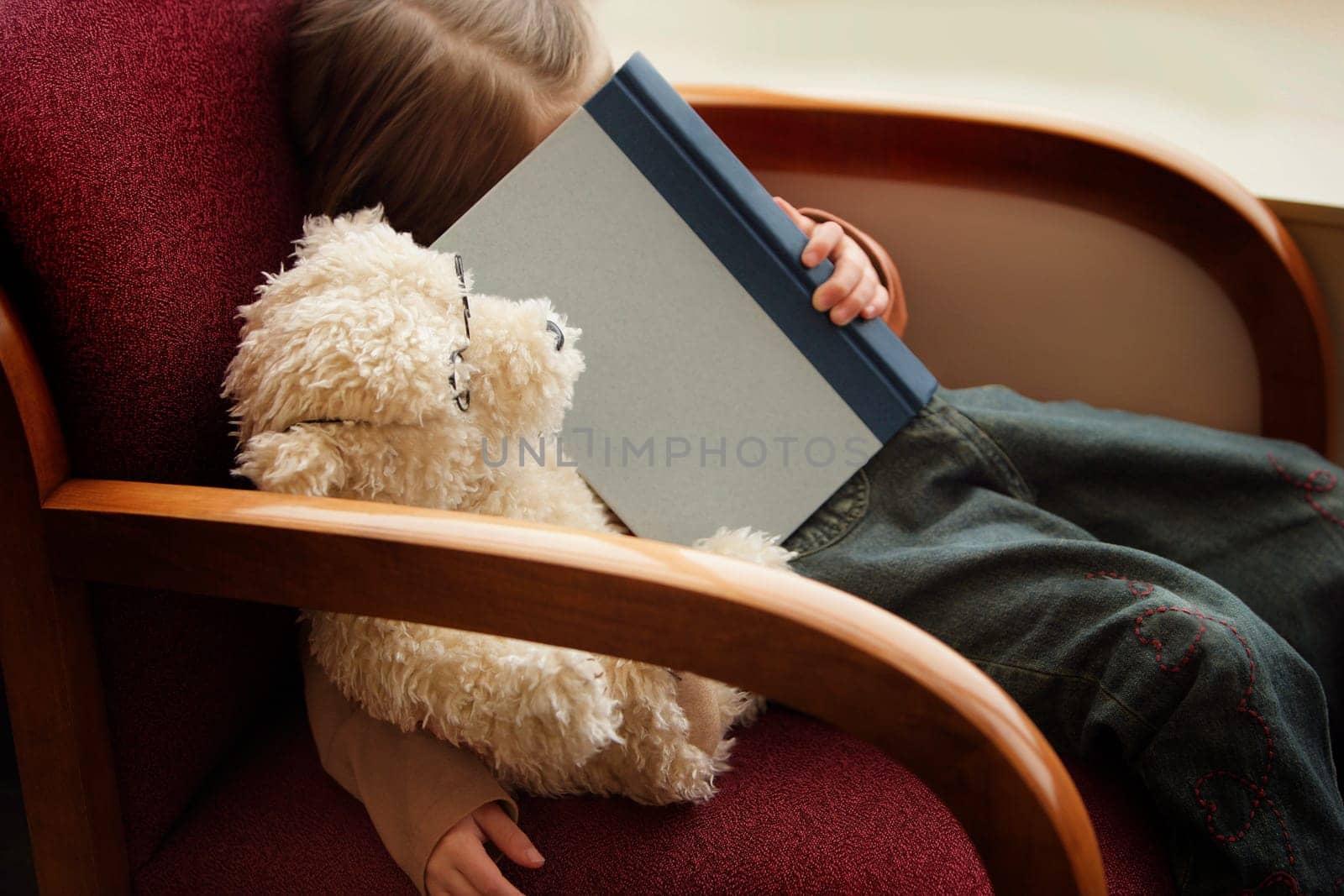 Child falls asleep with book