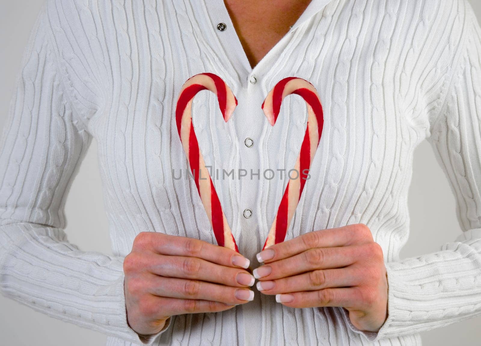 Woman holding Candy Canes