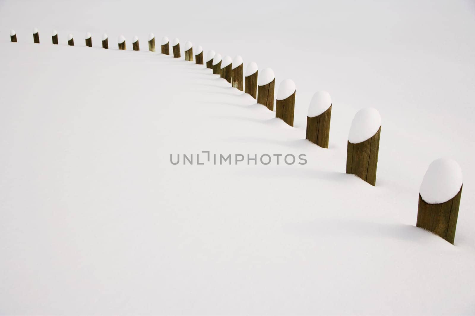 Posts covered in snow