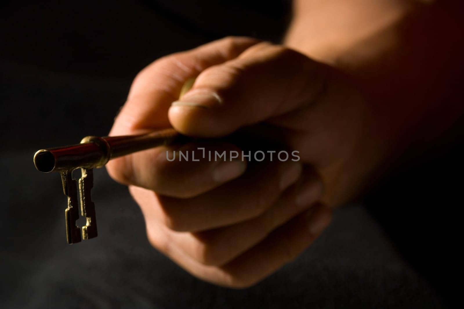 Hand holding key