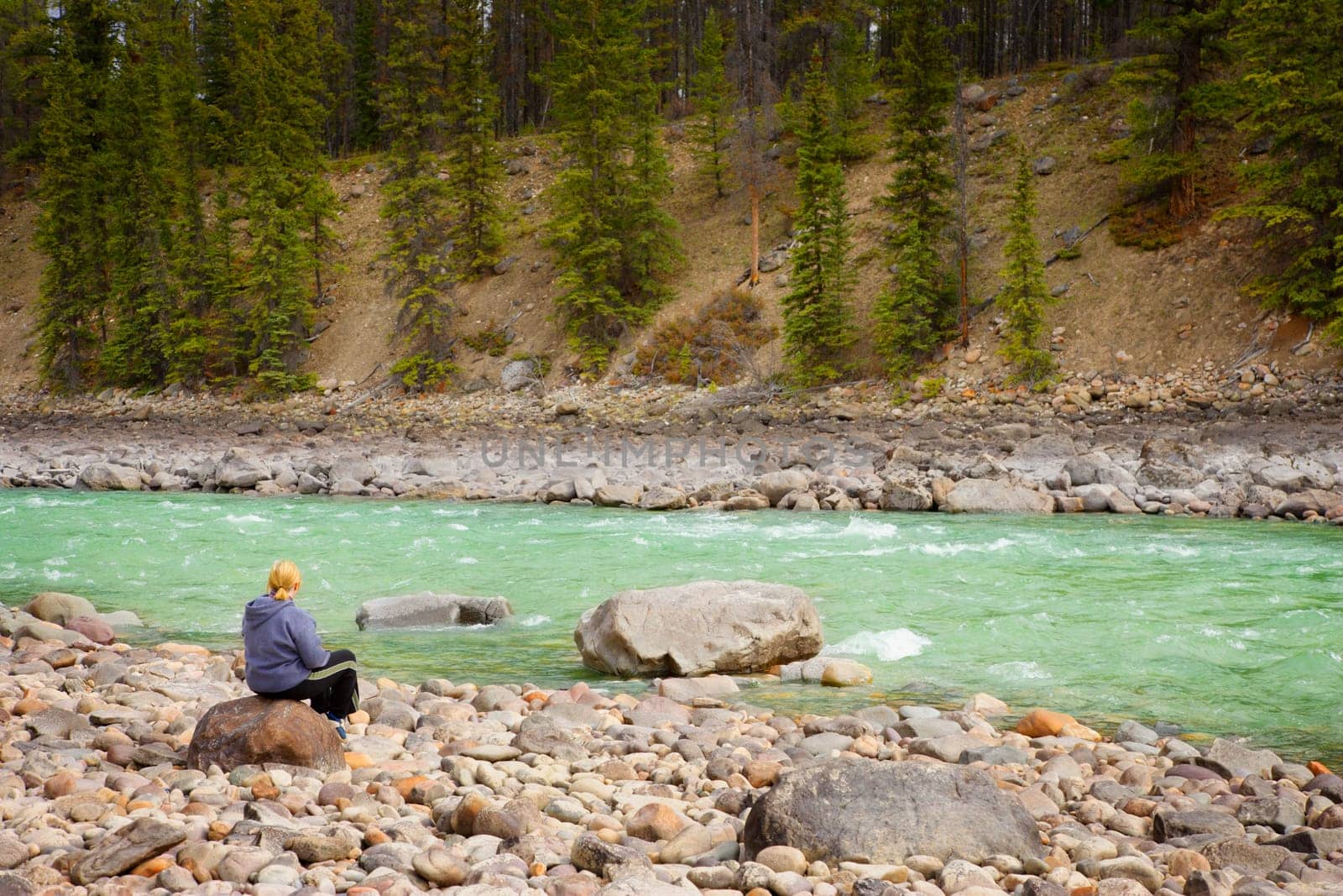 Person enjoying a river