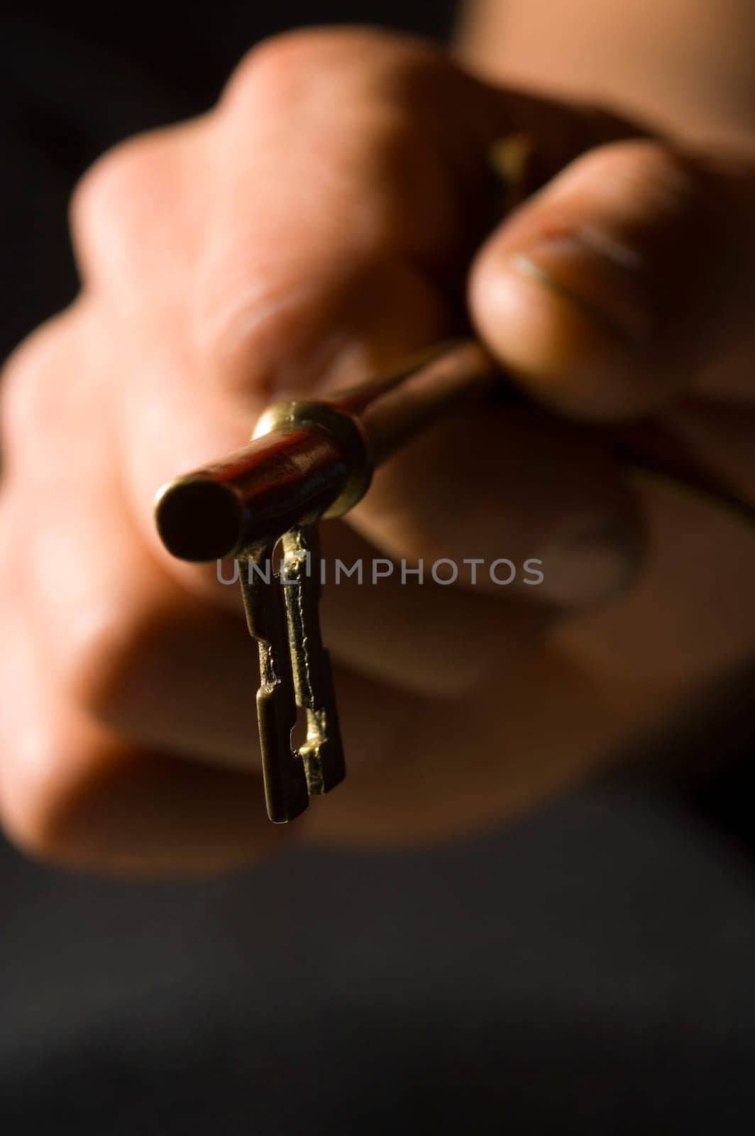 Hand with key