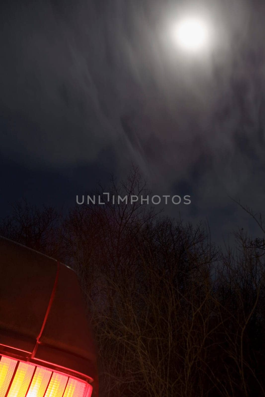 Moon behind clouds