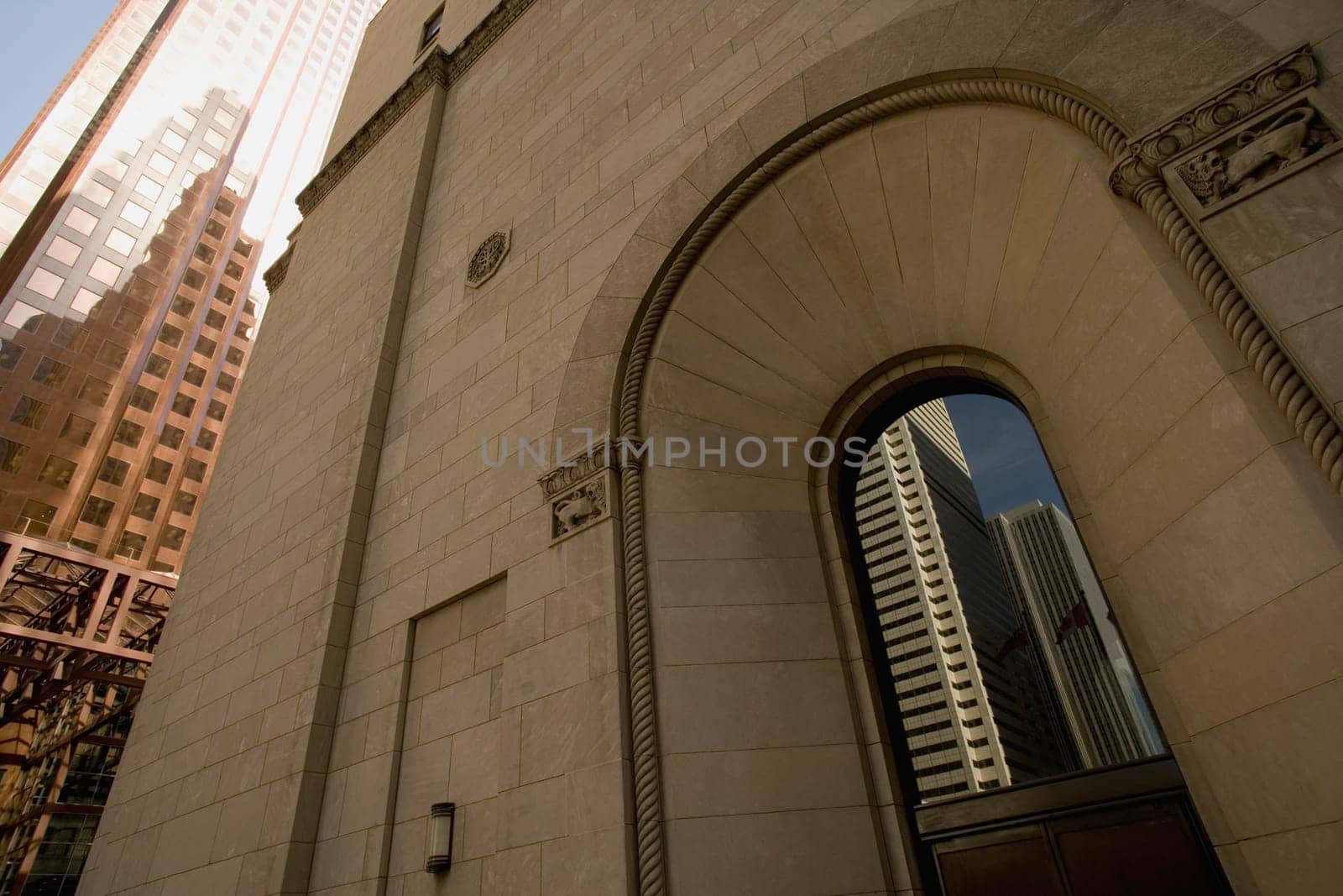Reflection of downtown buildings in window