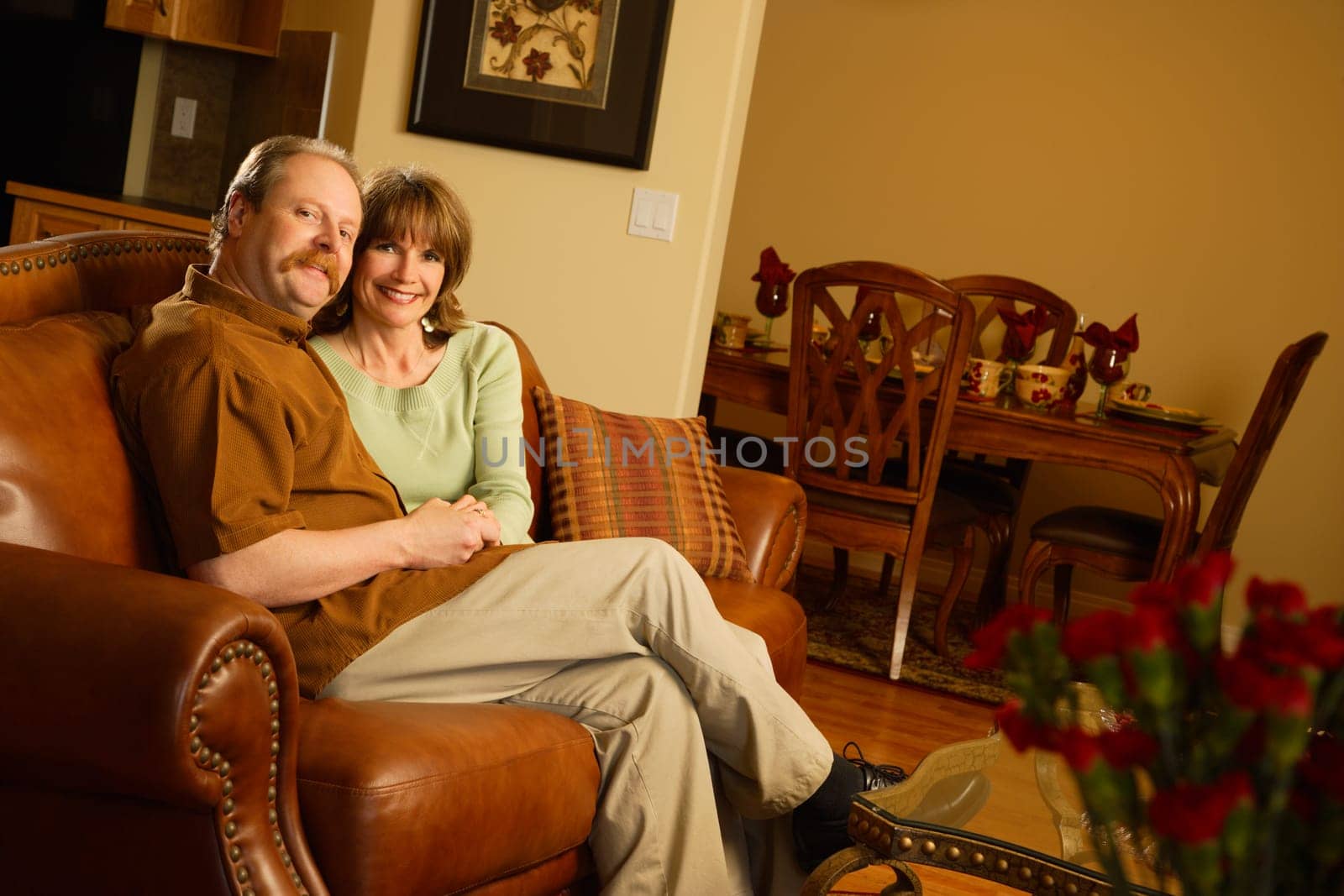 Couple sitting on sofa