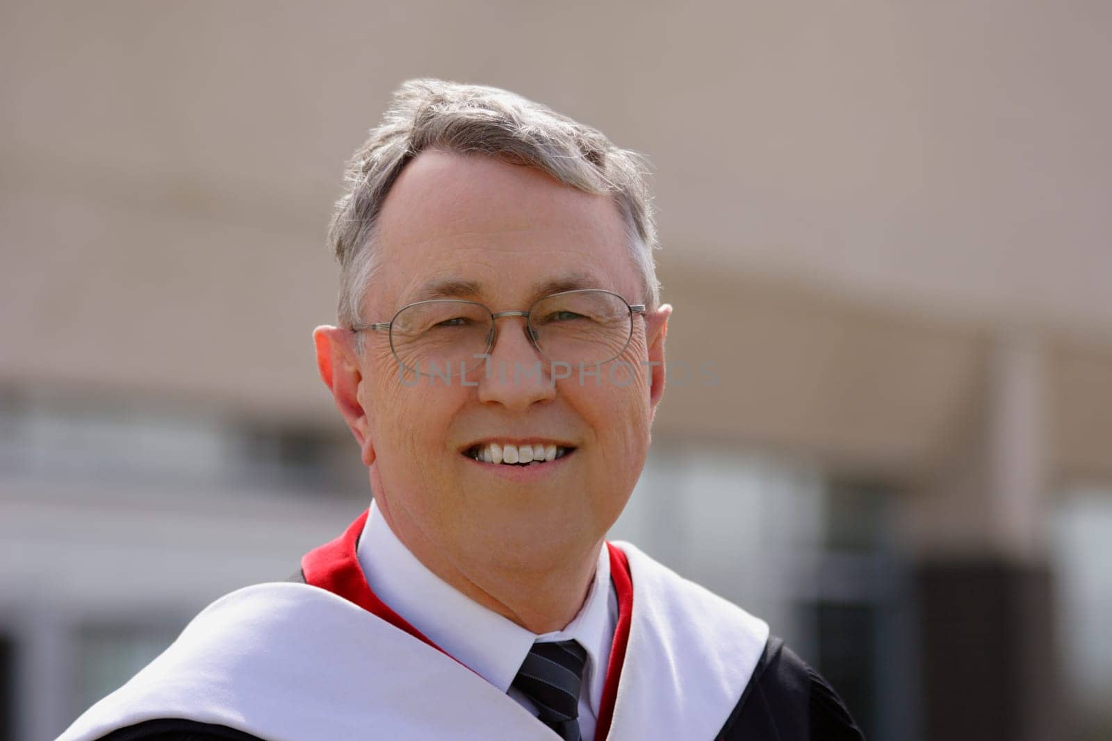 Senior in a graduation gown