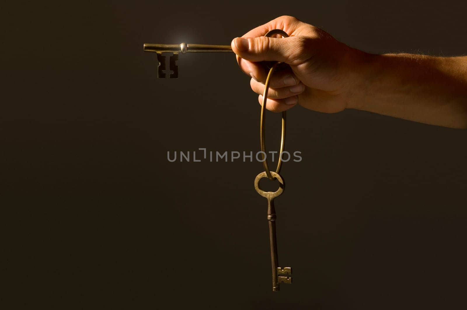 Hand holding keys