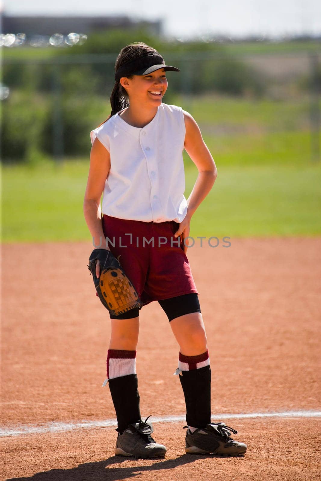 Girl enjoying playing baseball