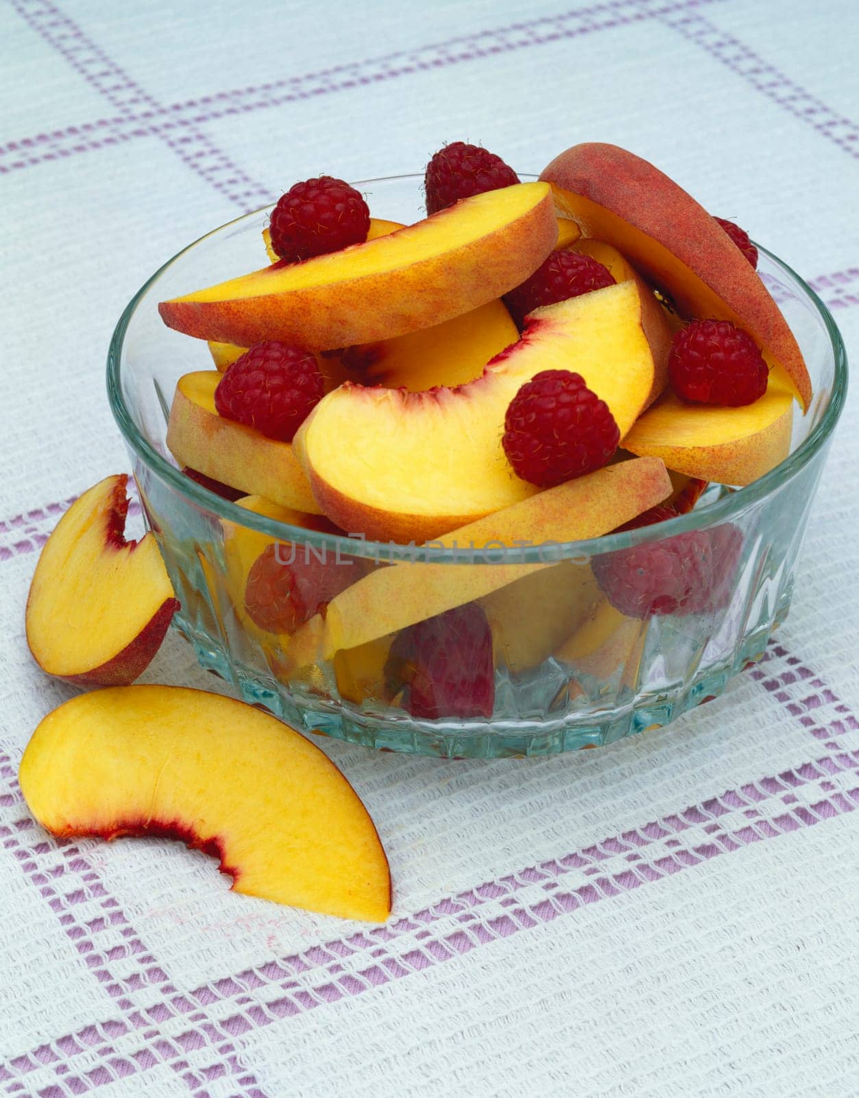 Raspberries and peach slices