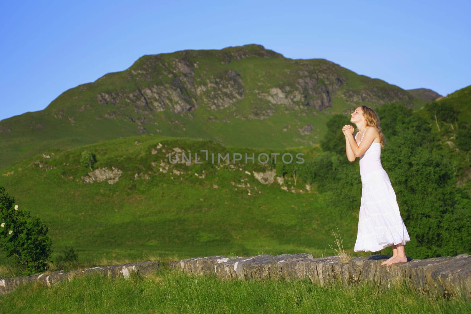 Praying in the mountains