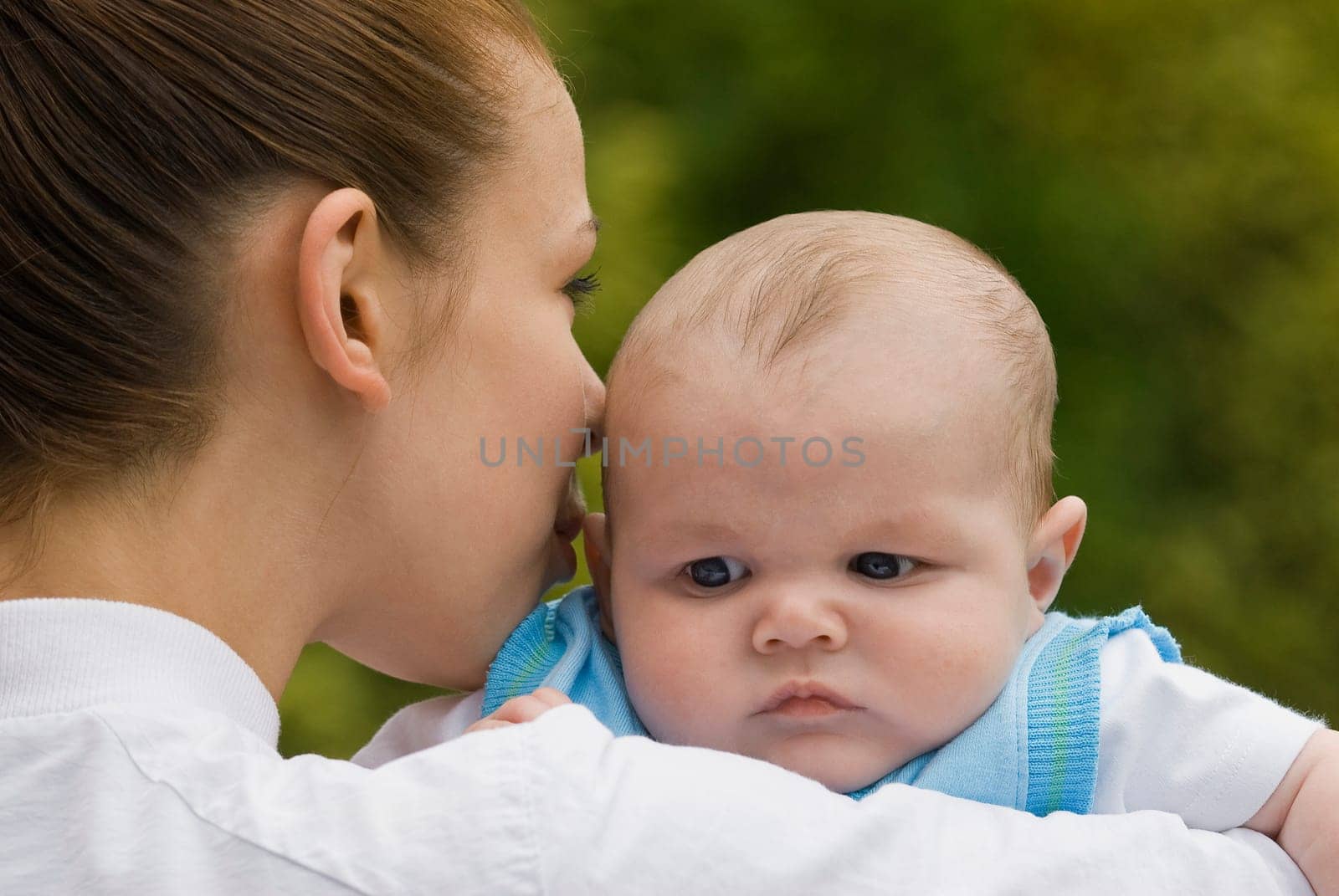 Mother holding baby boy