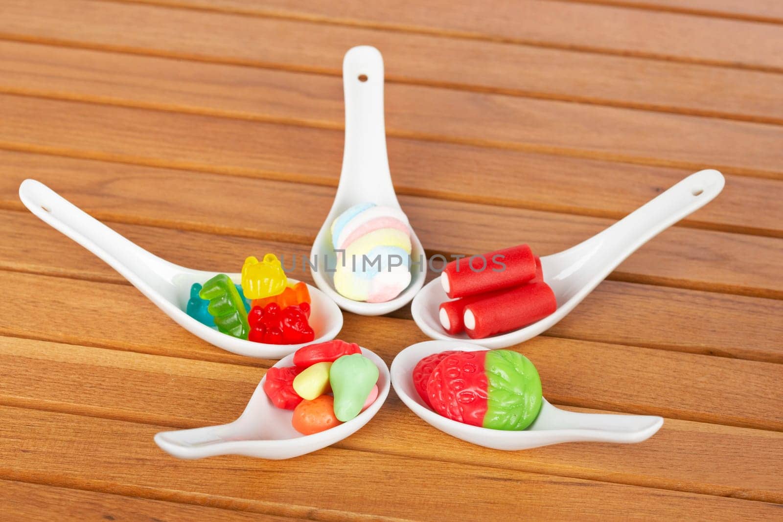 Candies in the spoons