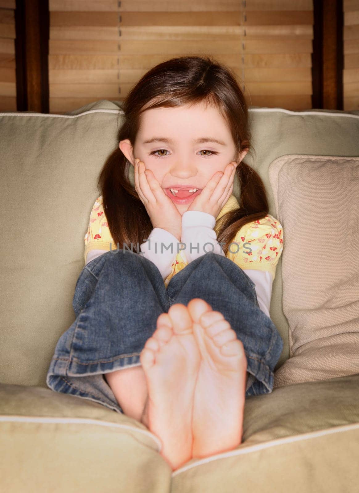 Girl sitting on a couch