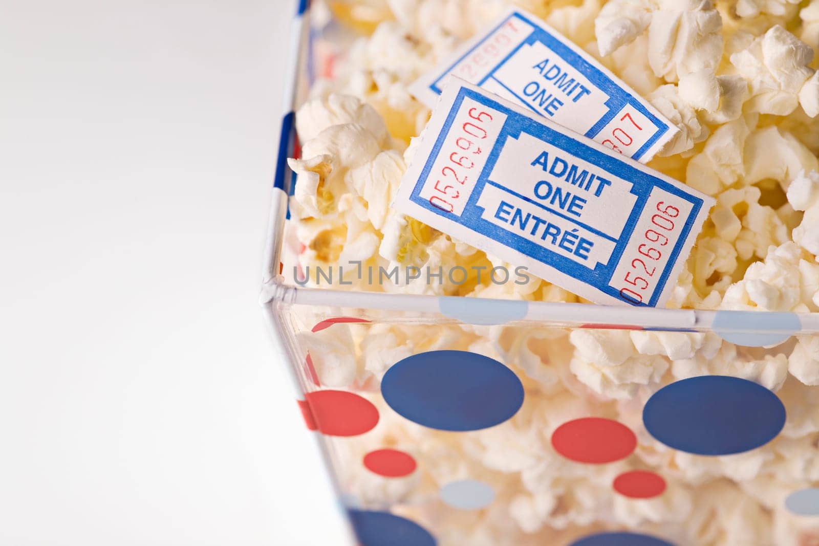 Popcorn bowl with movie tickets