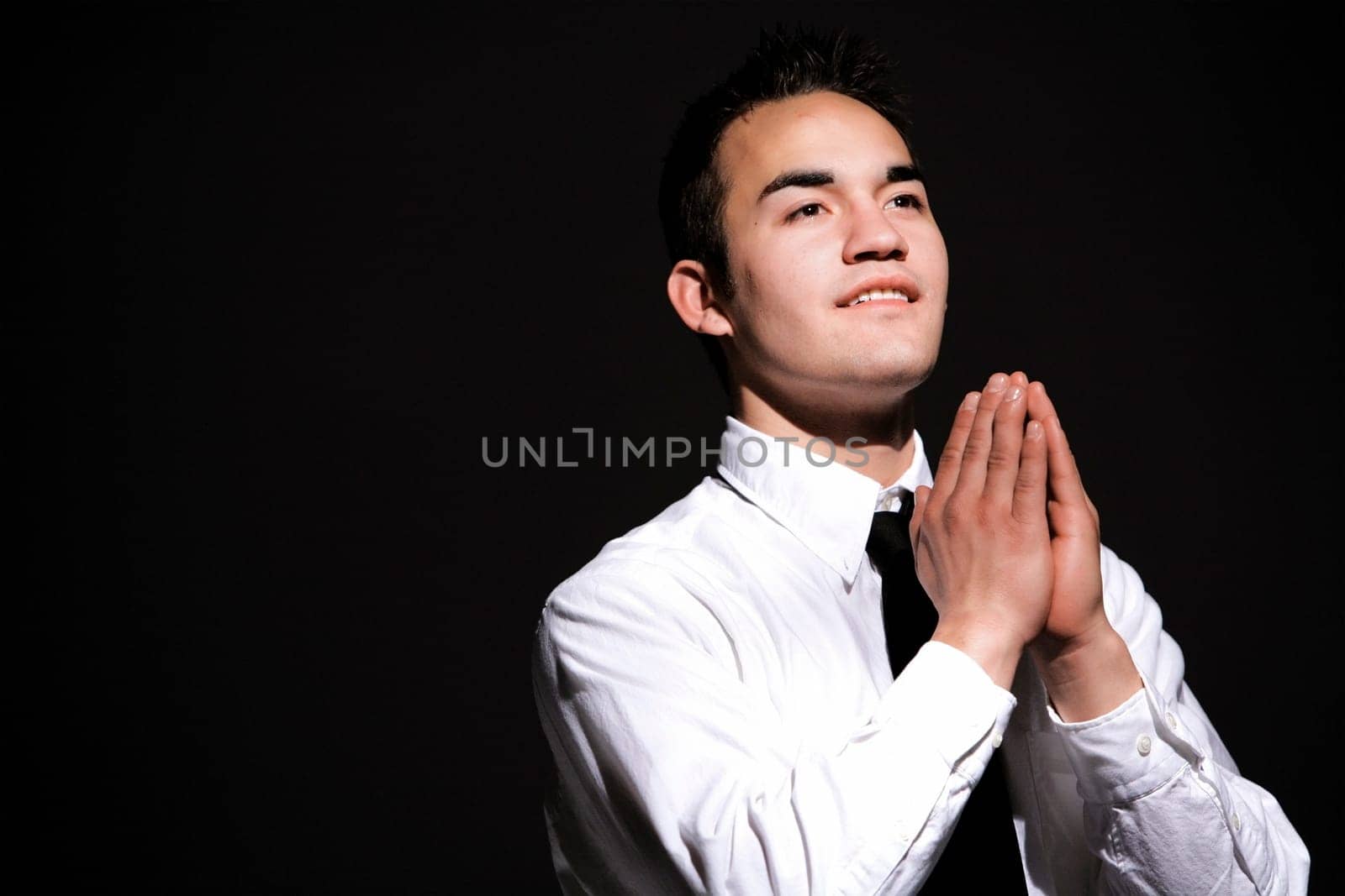 Young man praying