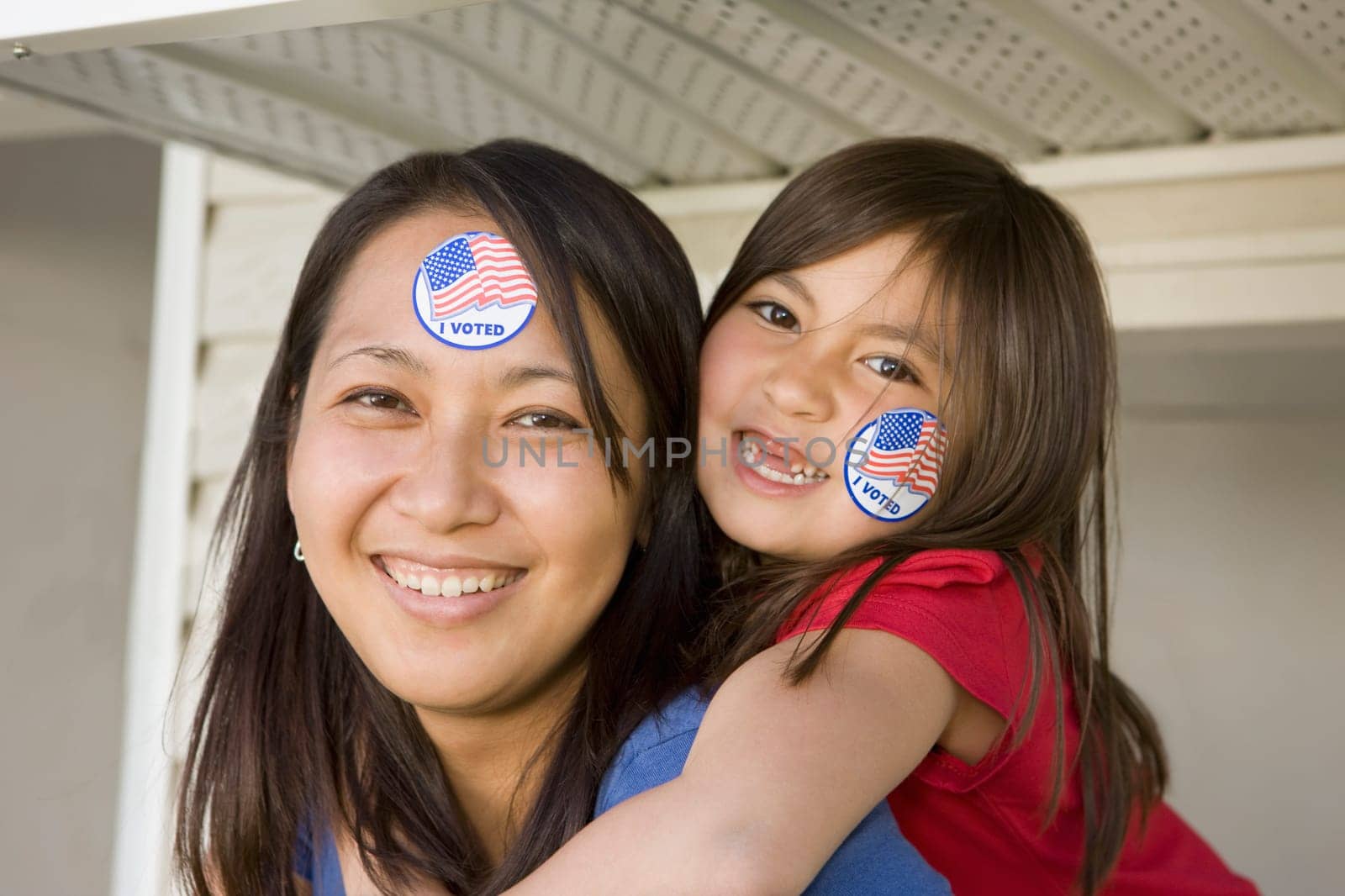Portrait of mother and daughter