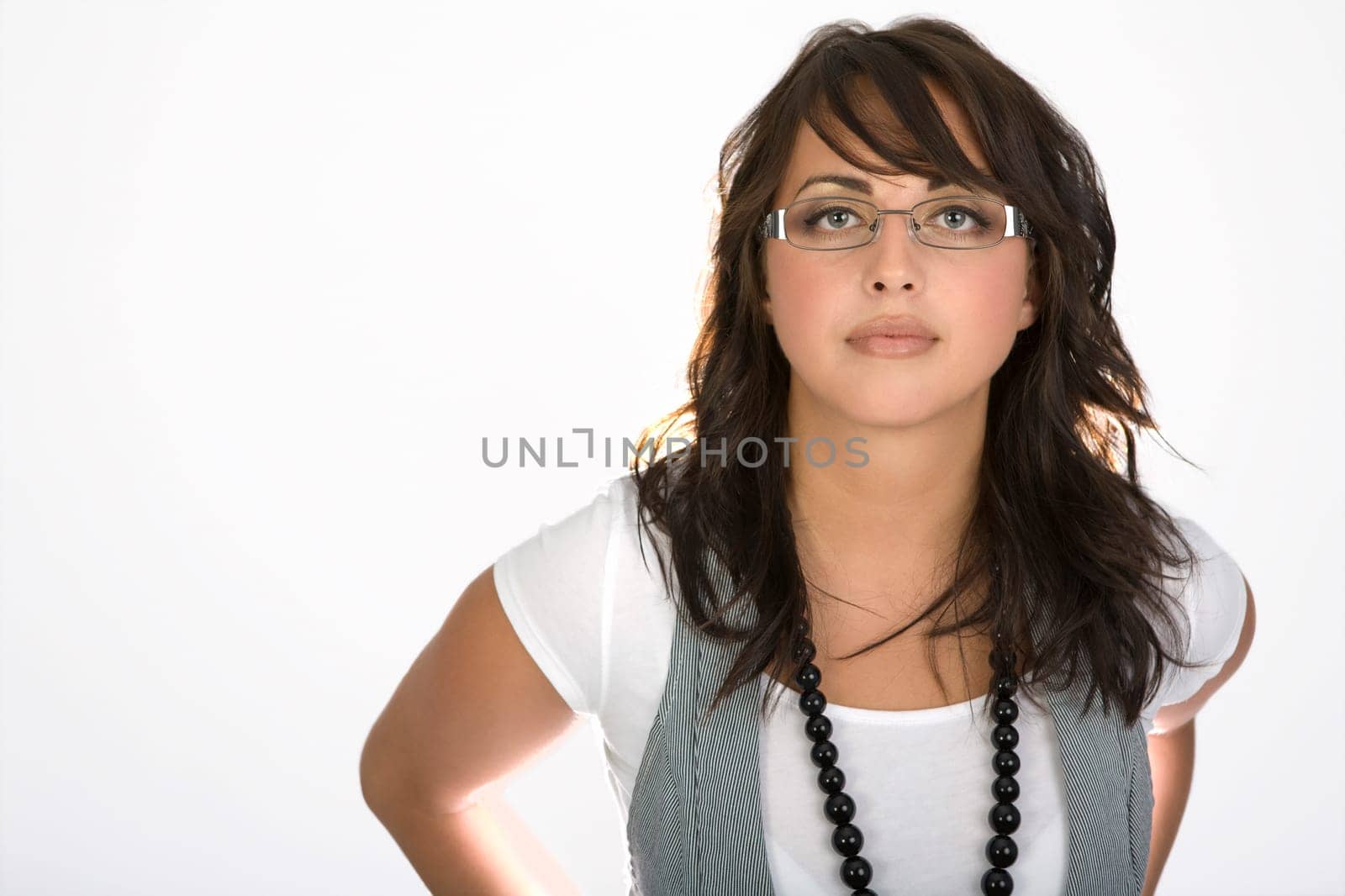 Woman wearing glasses and a vest