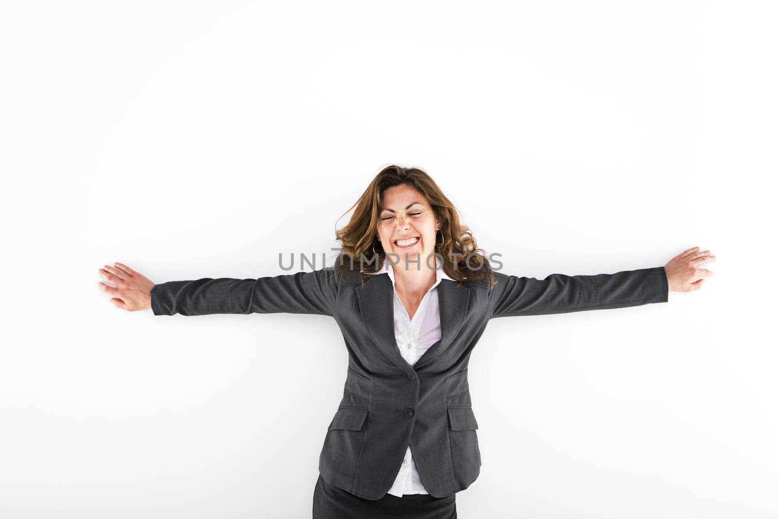 Woman with her arms raised