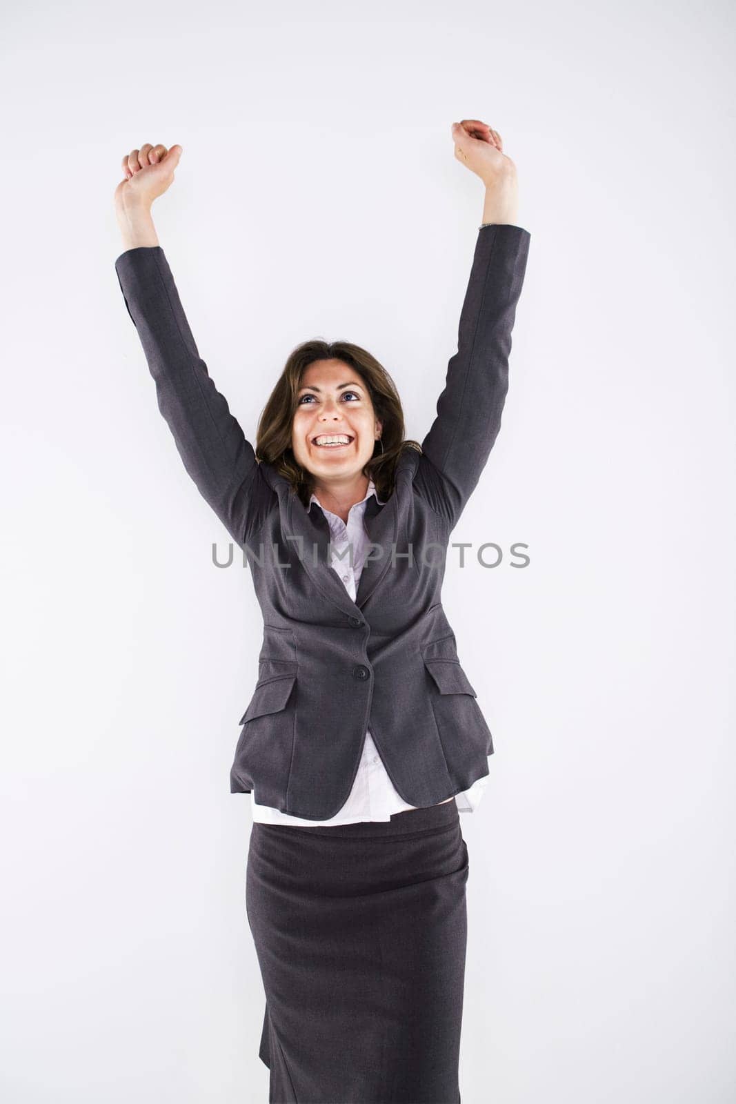 Woman with her arms raised