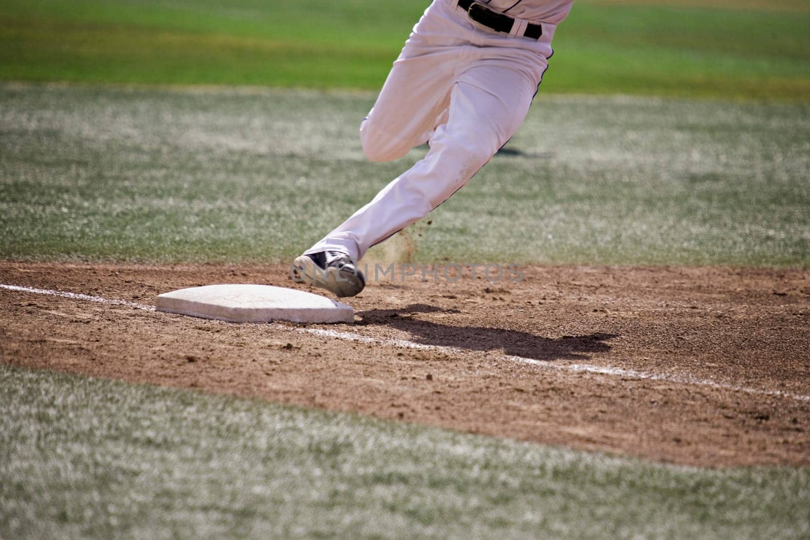Baseball player running home