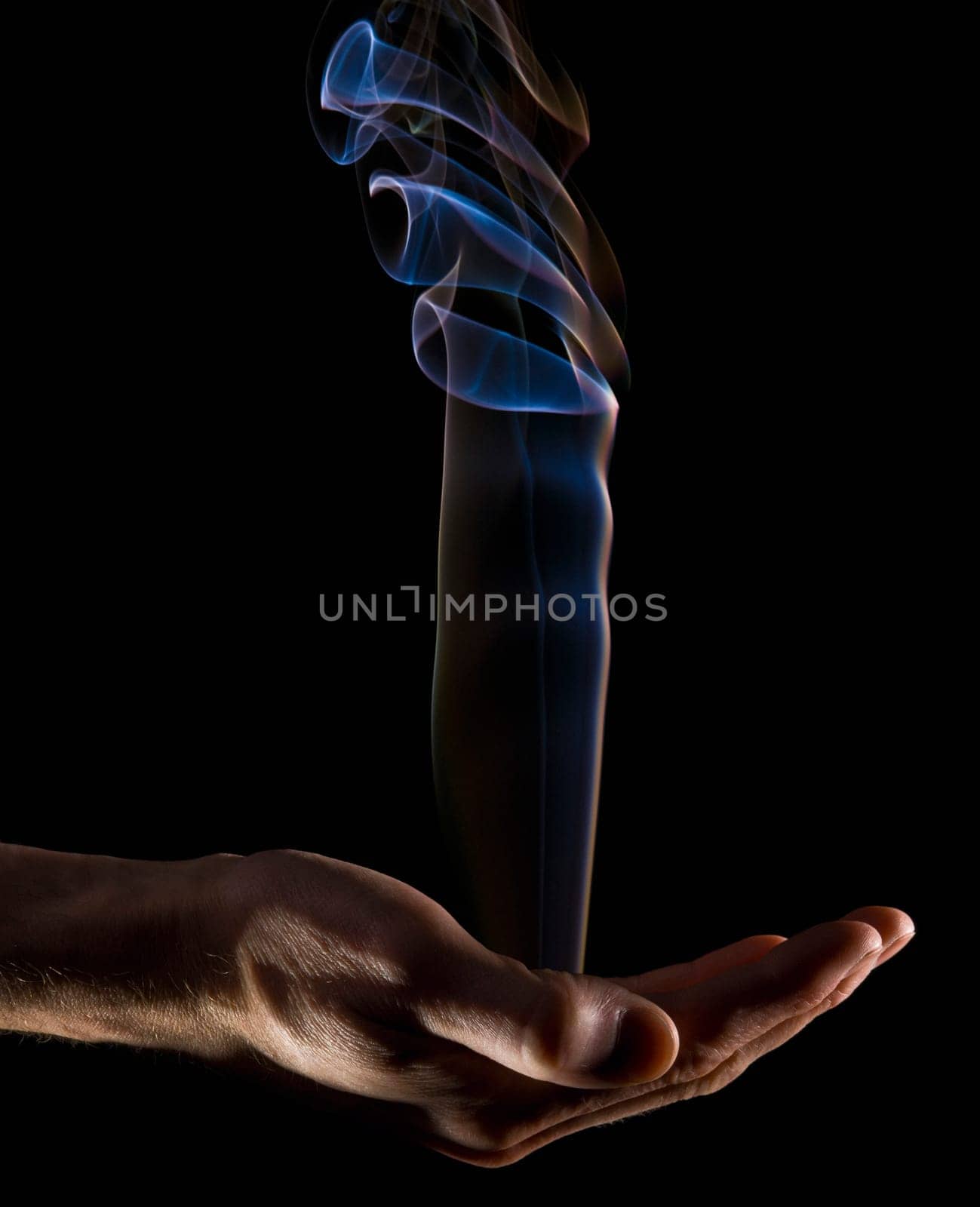 Smoke rising from a hand