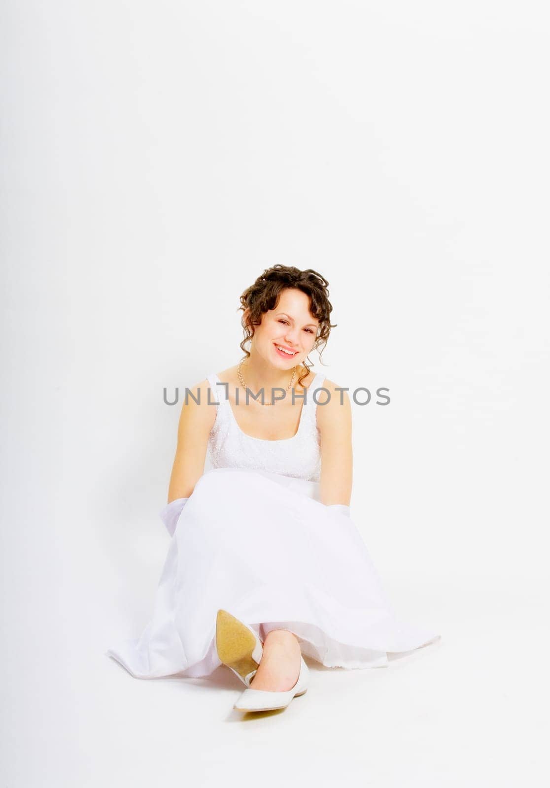 Smiling bride, sitting