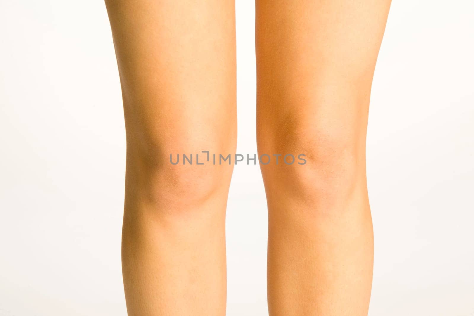 Young woman's knees