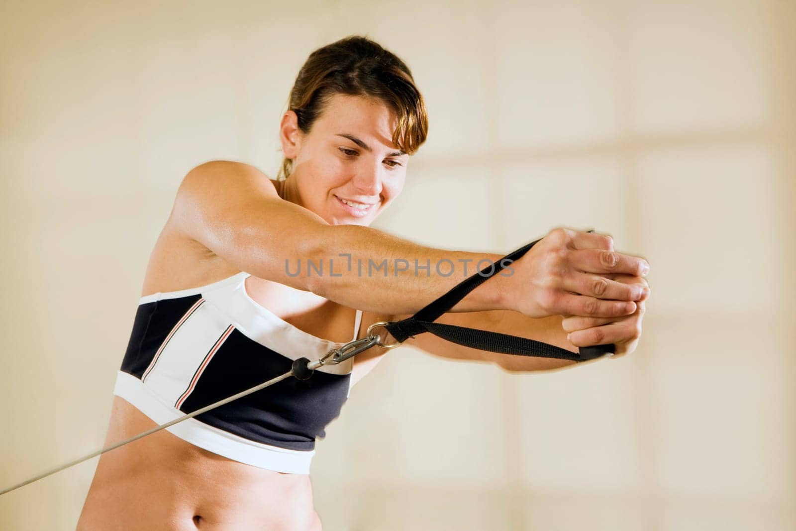 Young woman training in gym