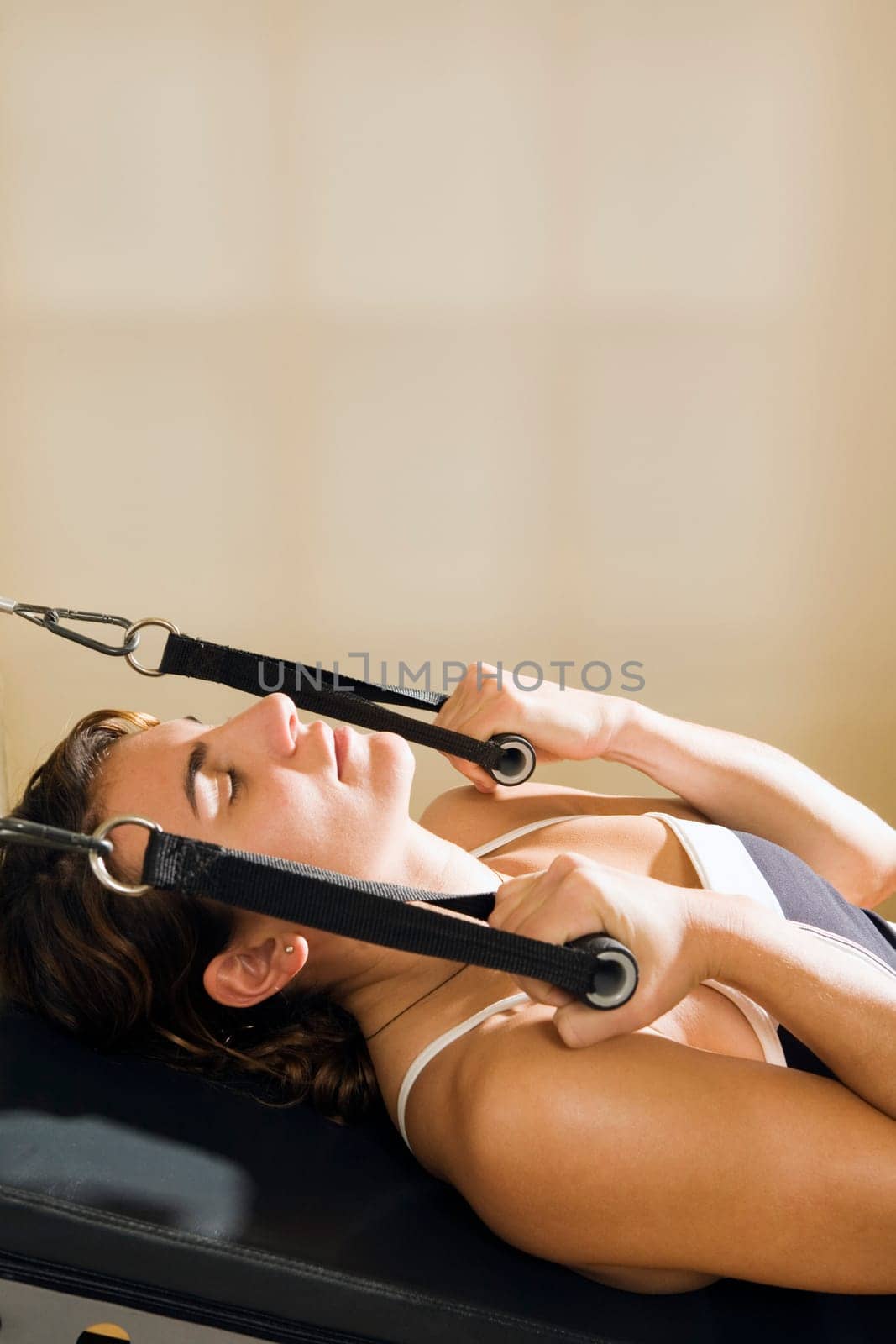 Woman on exercise machine