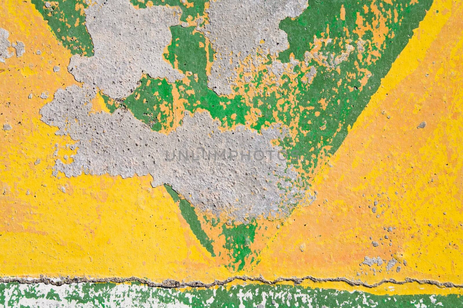 Distressed paint on concrete wall