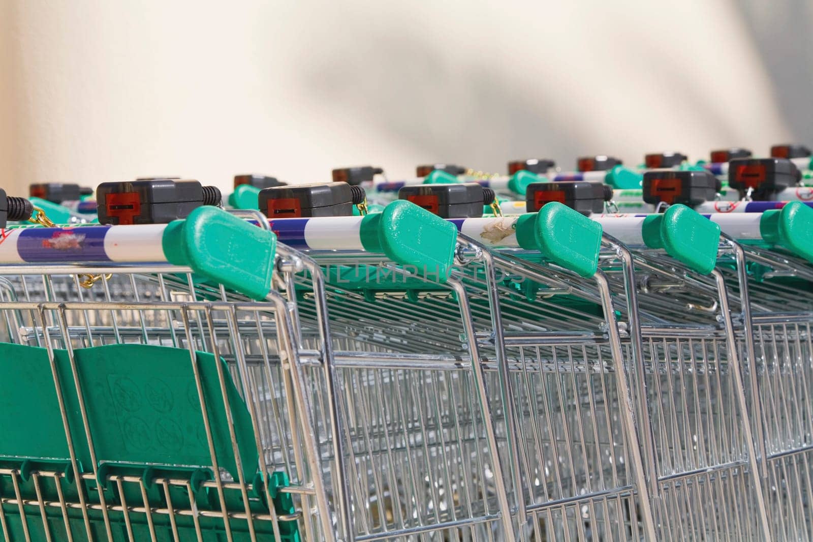 Shopping carts Rows of shopping trolleys outside supermarket