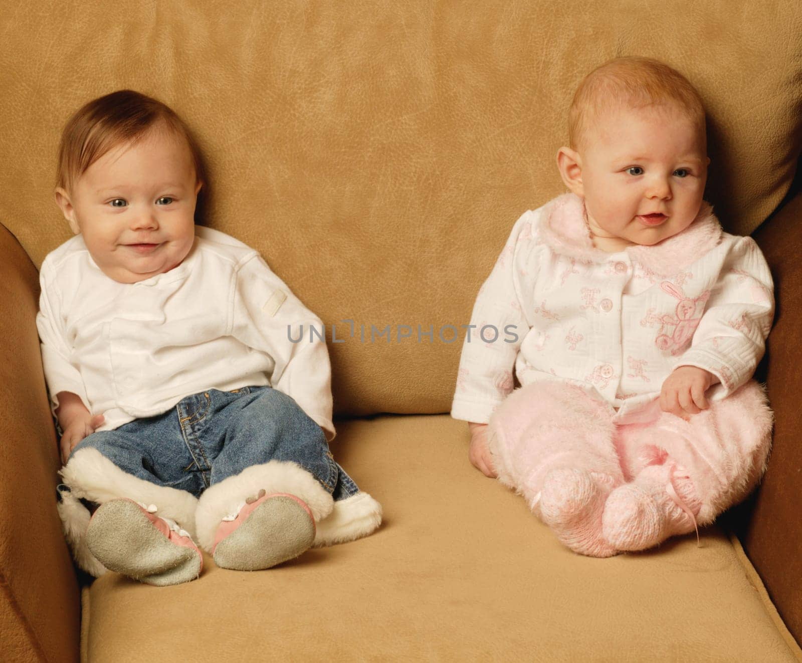 Baby girls sitting together