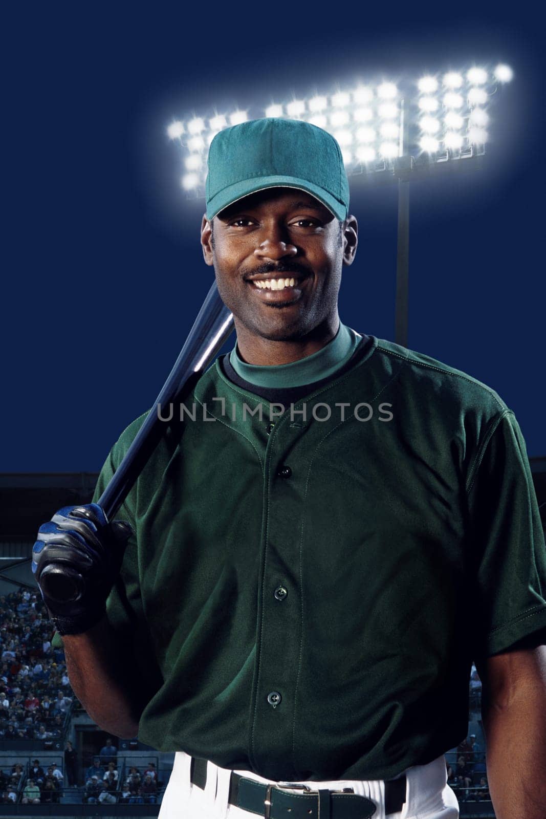 Baseball player with bat on shoulder