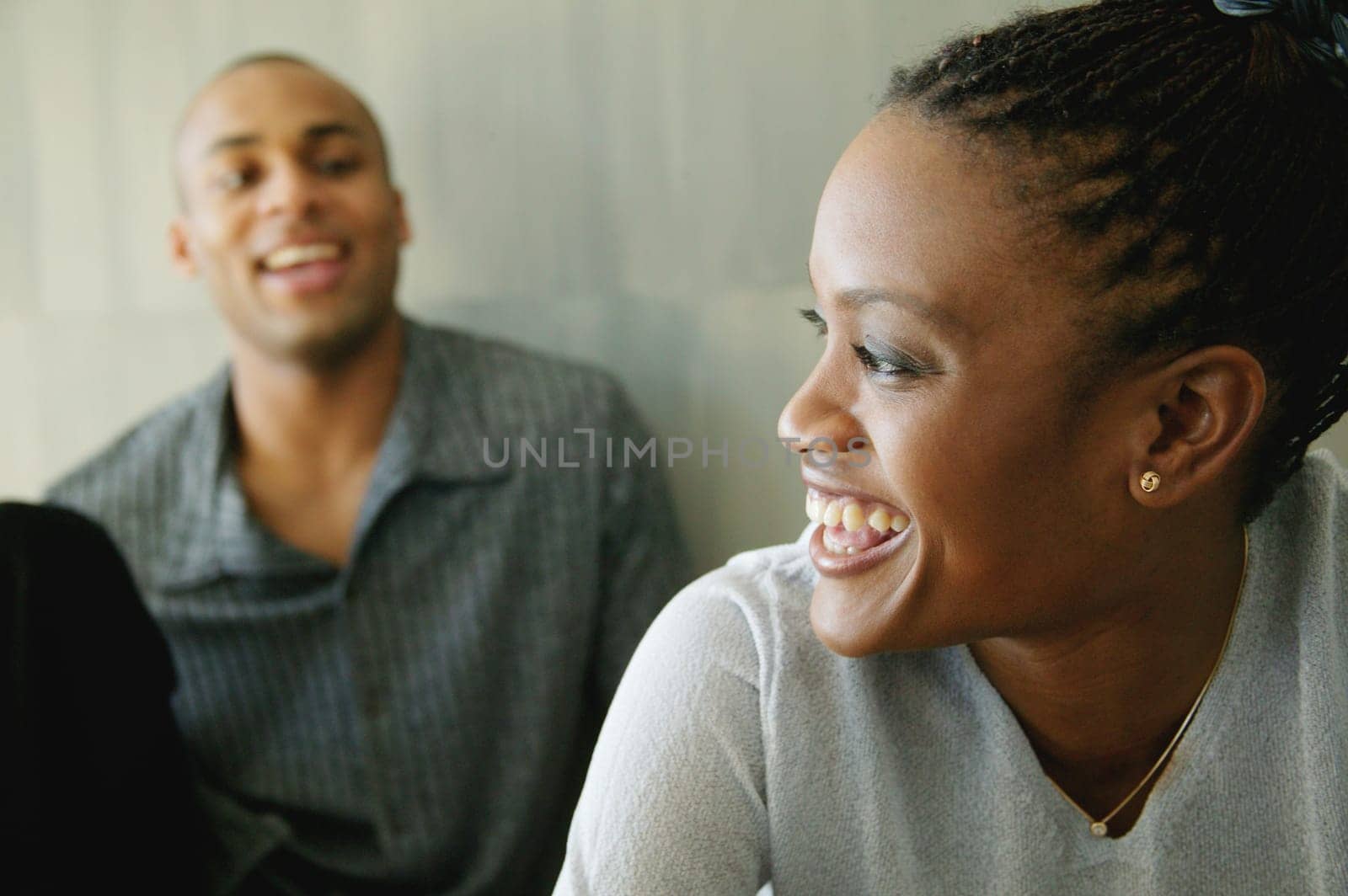Woman listens to man