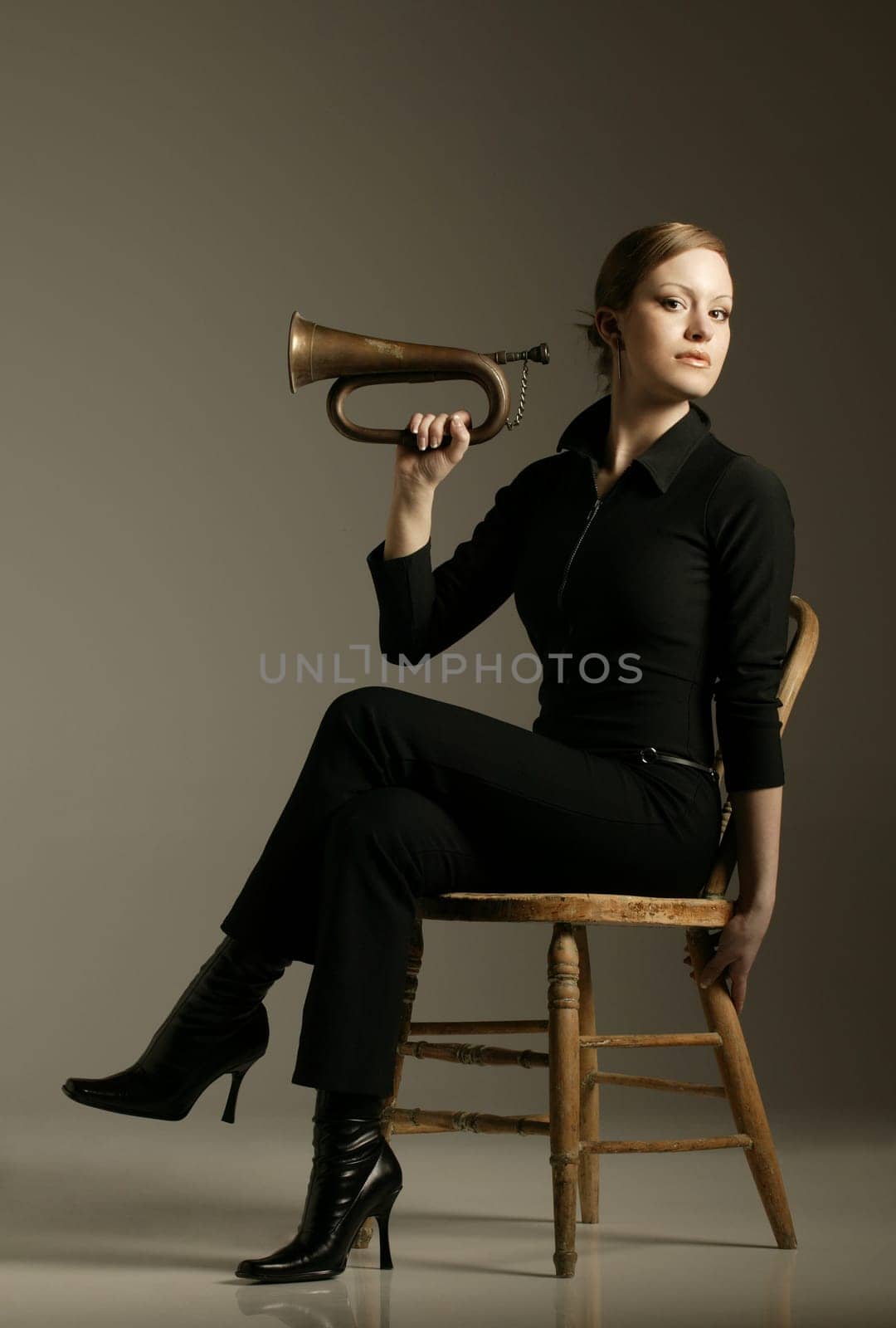 Sitting trumpet player